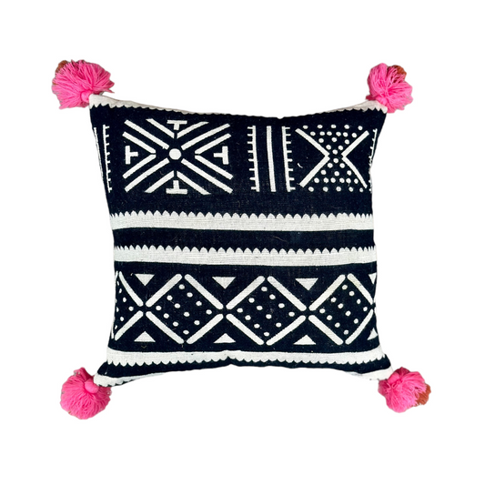 Tribal-Inspired Monochrome Pillow with Vibrant Tassel Accents